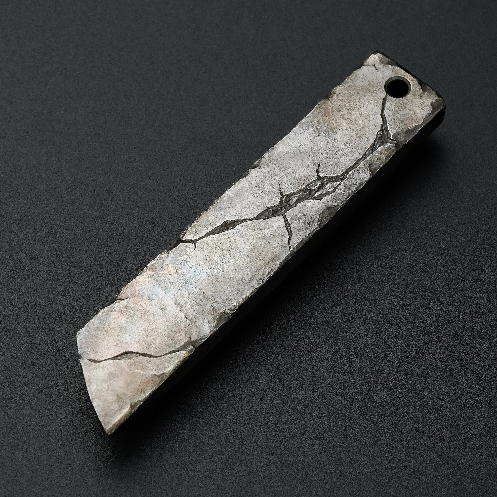 MecArmy RL4-HC hand-carved titanium EDC pry bar featuring a unique deep cracked texture across the sculpted surface